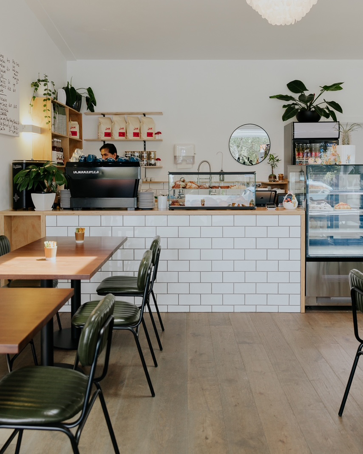 Isabella's counter with fresh pastries and cabinet food